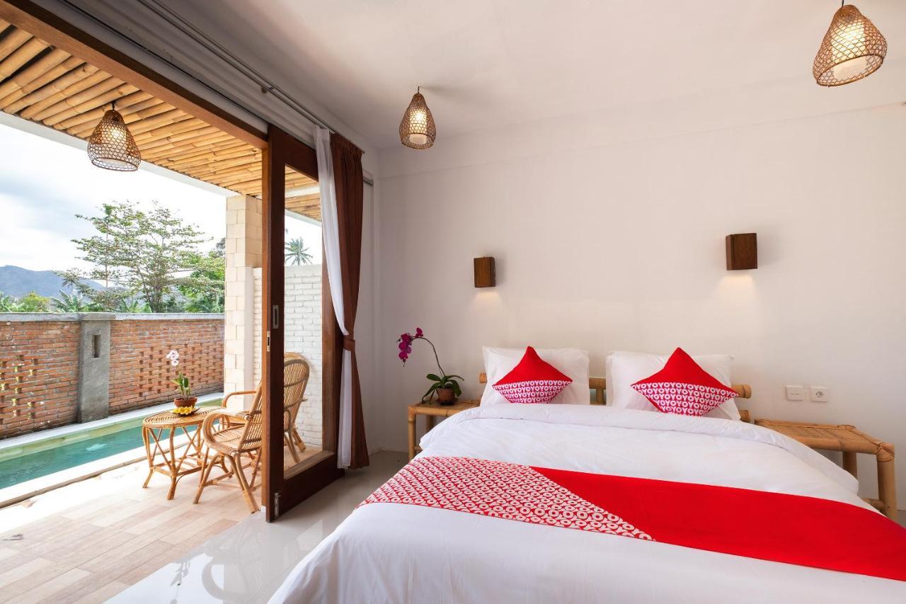 Oyo 1493 Surya Villa Selong Belanak Exterior foto