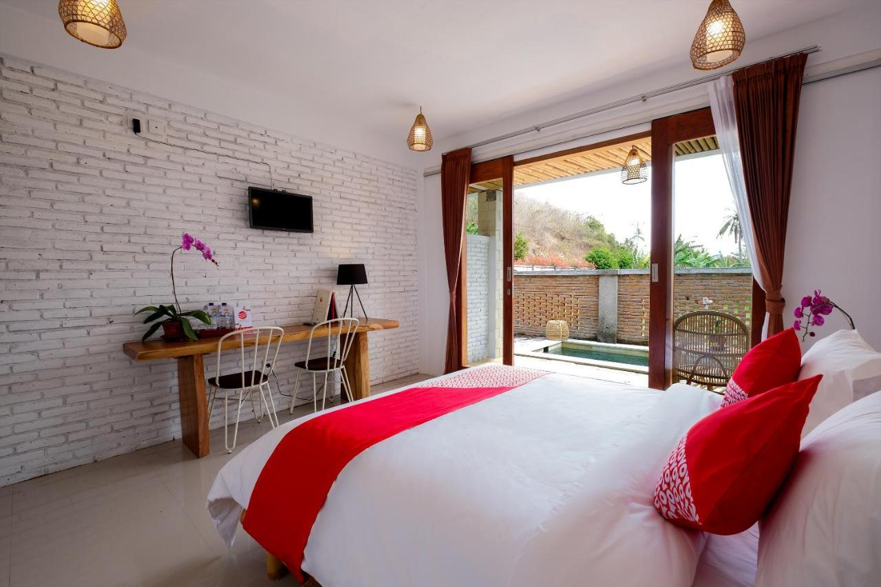 Oyo 1493 Surya Villa Selong Belanak Exterior foto